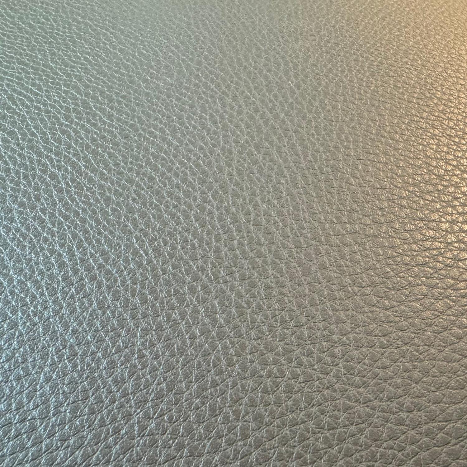 Minotti Jensen Sessel mit Hocker in Leder